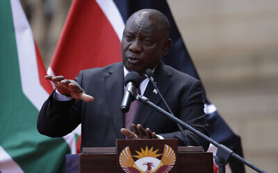 South African President Cyril Ramaphosa addresses the media after meeting with his Kenyan counterpart Uhuru Kenyatta in Pretoria, South Africa, November. 23, 2021. (AP Photo/Themba Hadebe)