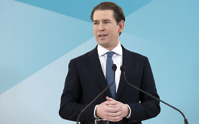 Former Austrian Chancellor Sebastian Kurz announces that he is quitting politics, two months after stepping down as leader amid corruption allegations, during a news conference in Vienna, Austria, Thursday, Dec. 2, 2021. (AP Photo/Lisa Leutner)