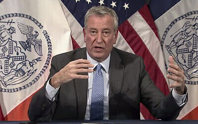 In this image taken from video, then New York Mayor Bill de Blasio speaks during a virtual press conference, in New York, Dec. 2, 2021. (AP Photo)