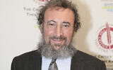 Actor Antony Sher poses for photographers after winning the best Shakespearean performance award at the Critics' Circle Theatre Awards in central London, on January 27, 2015. (Grant Pollard/Invision/AP, File)