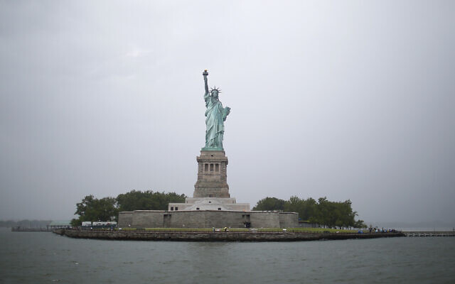 Illustrative: The Statue of Liberty is seen Thursday, July 1, 2021, in New York. Israel dropped dozens of countries from its no-fly list, but the US, UK, Canada remain prohibited. (AP Photo/Adam Hunger) Illustrative: The Statue of Liberty is seen Thursday, July 1, 2021, in New York. Israel dropped dozens of countries from its no-fly list, but the US, UK, Canada remain prohibited. (AP Photo/Adam Hunger)