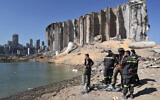 A rescue team surveys the site of a massive explosion in the port of Beirut, Lebanon, on August 7, 2020. (AP Photo/Thibault Camus, File)