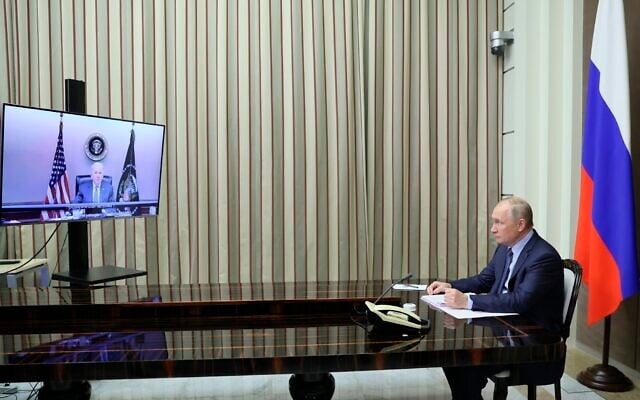 Russian President Vladimir Putin is shown during a conversation with US President Joe Biden via videoconference in the Bocharov Ruchei residence in the Black Sea resort of Sochi, Russia, December 7, 2021. (Mikhail Metzel, Sputnik, Kremlin Pool Photo via AP) Russian President Vladimir Putin is shown during a conversation with US President Joe Biden via videoconference in the Bocharov Ruchei residence in the Black Sea resort of Sochi, Russia, December 7, 2021. (Mikhail Metzel, Sputnik, Kremlin Pool Photo via AP)
