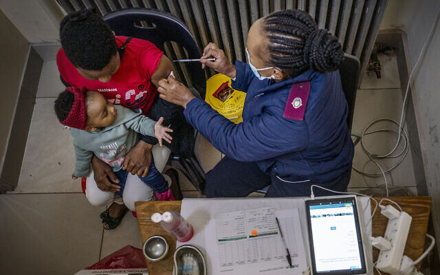 A woman is vaccinated against COVID-19 at the Hillbrow Clinic in Johannesburg, South Africa, Dec. 6, 2021 (AP Photo/ Shiraaz Mohamed, File) A woman is vaccinated against COVID-19 at the Hillbrow Clinic in Johannesburg, South Africa, Dec. 6, 2021 (AP Photo/ Shiraaz Mohamed, File)