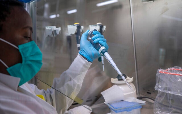 Doctors prepare to sequence COVID-19 Omicron samples at the Ndlovu Research Center in Elandsdoorn, South Africa, on December 8, 2021. (AP Photo/Jerome Delay) Doctors prepare to sequence COVID-19 Omicron samples at the Ndlovu Research Center in Elandsdoorn, South Africa, on December 8, 2021. (AP Photo/Jerome Delay)