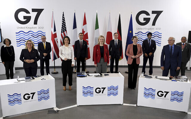 G7 Foreign and Development Ministers pose for a group photo in Liverpool, England Sunday, Dec. 12, 2021. (Olivier Douliery/Pool via AP) G7 Foreign and Development Ministers pose for a group photo in Liverpool, England Sunday, Dec. 12, 2021. (Olivier Douliery/Pool via AP)