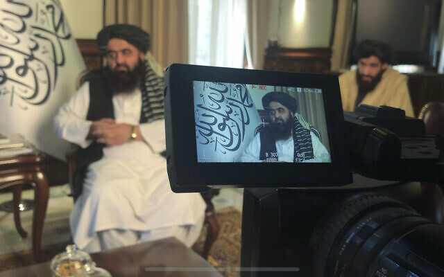 The foreign minister in Afghanistan's new Taliban-run Cabinet, Amir Khan Muttaqi speaks during an interview to the Associated Press in Kabul, Afghanistan, December 12, 2021. (Mohammed Shoaib Amin) The foreign minister in Afghanistan's new Taliban-run Cabinet, Amir Khan Muttaqi speaks during an interview to the Associated Press in Kabul, Afghanistan, December 12, 2021. (Mohammed Shoaib Amin)