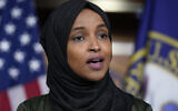 Rep. Ilhan Omar, Democrat of Minnesota, speaks to reporters in the wake of anti-Islamic comments made by Rep. Lauren Boebert, Republican of Colorado, who likened Omar to a bomb-carrying terrorist, during a news conference at the Capitol in Washington, Nov. 30, 2021. (J. Scott Applewhite/AP)