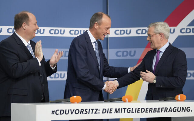 From left, candidate Helge Braun, new elected party chairman Friedrich Merz and candidate Norbert Roettgen, attend a press conference of the German Christian Democratic Party (CDU) at the party's headquarters in Berlin, Germany, December 17, 2021 to announce the results of a ballot on who will become its new leader. (AP Photo/Michael Sohn) From left, candidate Helge Braun, new elected party chairman Friedrich Merz and candidate Norbert Roettgen, attend a press conference of the German Christian Democratic Party (CDU) at the party's headquarters in Berlin, Germany, December 17, 2021 to announce the results of a ballot on who will become its new leader. (AP Photo/Michael Sohn)