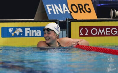 Israel's Anastasia Gorbenko smiles after winning 50 meters breaststroke during World Swimming Championships in Abu Dhabi, United Arab Emirates, December 17, 2021. (AP Photo/Kamran Jebreili) Israel's Anastasia Gorbenko smiles after winning 50 meters breaststroke during World Swimming Championships in Abu Dhabi, United Arab Emirates, December 17, 2021. (AP Photo/Kamran Jebreili)
