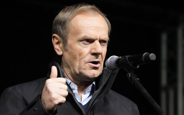 Donald Tusk, the leader of Poland's largest opposition party, Civic Platform, speaks to people joining a demonstration after the Polish parliament approved a bill that is widely viewed as an attack on media freedom, in Warsaw, Poland, on December 19, 2021. (AP Photo/Czarek Sokolowski) Donald Tusk, the leader of Poland's largest opposition party, Civic Platform, speaks to people joining a demonstration after the Polish parliament approved a bill that is widely viewed as an attack on media freedom, in Warsaw, Poland, on December 19, 2021. (AP Photo/Czarek Sokolowski)