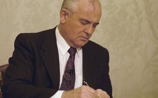 Mikhail Gorbachev, the final leader of the Soviet Union, signs the decree relinquishing control of nuclear weapons to Boris Yeltsin at the Kremlin in Moscow, Wednesday, Dec. 25, 1991. (AP Photo/Liu Heung Shing, File) Mikhail Gorbachev, the final leader of the Soviet Union, signs the decree relinquishing control of nuclear weapons to Boris Yeltsin at the Kremlin in Moscow, Wednesday, Dec. 25, 1991. (AP Photo/Liu Heung Shing, File)