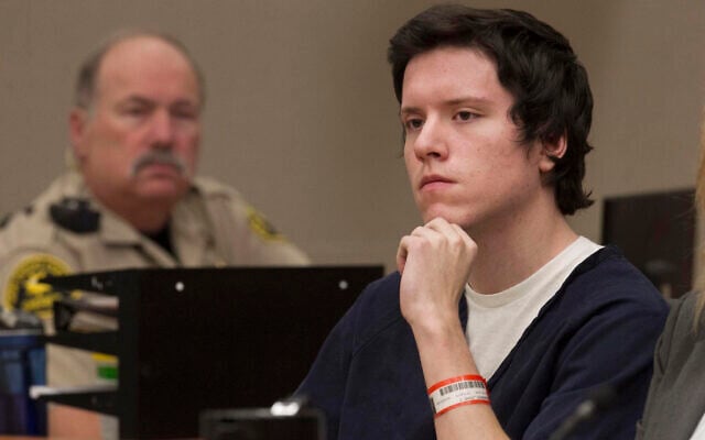 FILE - Defendant John Earnest listens during testimony by witness Oscar Stewart during Earnest's preliminary hearing, Thursday, Sept. 19, 2019, in Superior Court in San Diego. Earnest has been sentenced on Tuesday, Dec. 28, 2021, to life in federal prison for killing a woman and injuring three others when he burst into a Southern California synagogue in 2019, adding to a life sentence he received three months earlier in state court. (John Gibbins/The San Diego Union-Tribune via AP, Pool, File) FILE - Defendant John Earnest listens during testimony by witness Oscar Stewart during Earnest's preliminary hearing, Thursday, Sept. 19, 2019, in Superior Court in San Diego. Earnest has been sentenced on Tuesday, Dec. 28, 2021, to life in federal prison for killing a woman and injuring three others when he burst into a Southern California synagogue in 2019, adding to a life sentence he received three months earlier in state court. (John Gibbins/The San Diego Union-Tribune via AP, Pool, File)