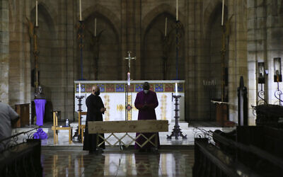 The body of Anglican Archbishop Emeritus Desmond Tutu lies in state at the St. George's Cathedral in Cape Town, South Africa, on December 30, 2021. (AP Photo/Tsvangirayi Mukwazhi)