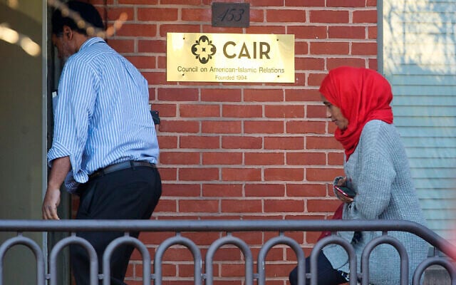 People walk into the headquarters of the Council on American-Islamic Relations (CAIR) in Washington, DC, on Thursday, December 10, 2015. (AP Photo/Pablo Martinez Monsivais)