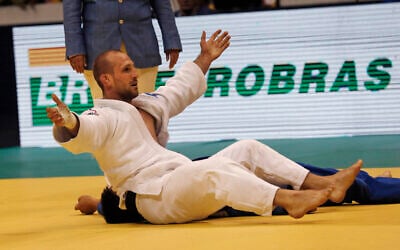 Alain Schmitt, from France, celebrates his victory over Uuganbaatar Otgonbaatar, from Mongolia, after their men's - 81 kg fight at the World Judo Championships in Rio de Janeiro, Brazil, Thursday, Aug. 29, 2013. Schmitt won the bronze. (AP Photo/Silvia Izquierdo) Alain Schmitt, from France, celebrates his victory over Uuganbaatar Otgonbaatar, from Mongolia, after their men's - 81 kg fight at the World Judo Championships in Rio de Janeiro, Brazil, Thursday, Aug. 29, 2013. Schmitt won the bronze. (AP Photo/Silvia Izquierdo)
