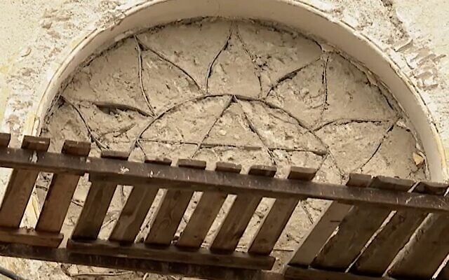 The mortar-covered frame of a synagogue's stained glass window is visible following renovations at the hospital of Bilohirsk in Crimea. (Crimea24 via JTA) The mortar-covered frame of a synagogue's stained glass window is visible following renovations at the hospital of Bilohirsk in Crimea. (Crimea24 via JTA)