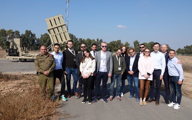 A group of young lawmakers on an ELNET delegation from Europe tour an Iron Dome battery near Sderot, November 22, 2021 (ELNET) A group of young lawmakers on an ELNET delegation from Europe tour an Iron Dome battery near Sderot, November 22, 2021 (ELNET)