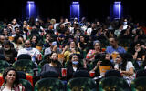 Illustrative -- People at the cinema on May 27, 2021 in Jerusalem (Olivier Fitoussi/Flash90)