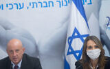 Education Minister Yifat Shasha-Biton and the ministry's director, Yigal Slovik, speak at a press conference in Tel Aviv, August 31, 2021. (Miriam Alster/Flash90)