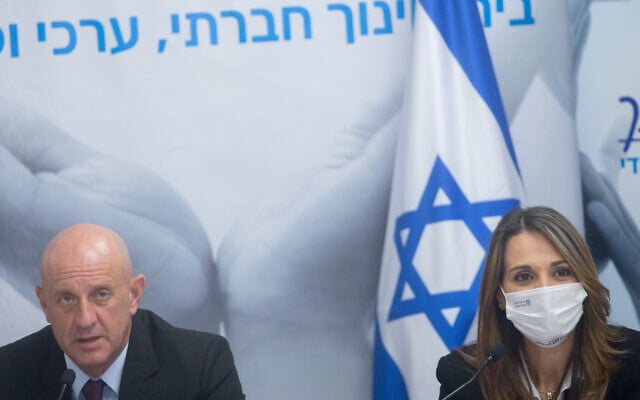 Education Minister Yifat Shasha-Biton and the ministry's director, Yigal Slovik, speak at a press conference in Tel Aviv, August 31, 2021. (Miriam Alster/Flash90) Education Minister Yifat Shasha-Biton and the ministry's director, Yigal Slovik, speak at a press conference in Tel Aviv, August 31, 2021. (Miriam Alster/Flash90)