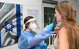 Illustrative: A health care volunteer takes a swab sample from an Israeli woman at a testing center set up by Magen David Adom in the Golan Heights town of Katzrin, September 15, 2021. (Michael Giladi/Flash90)