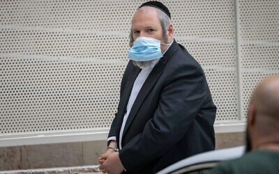 Beitar Illit mayor Meir Rubinstein arrives at the Jerusalem Magistrate's Court on November 22, 2021 (Yonatan Sindel/Flash90)