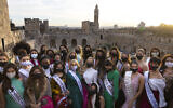 Miss Universe contestants visit the Tower of David Museum in the Old City of Jerusalem ahead of the December 12 70th Miss Universe pageant to be held in Eilat (Olivier Fitoussi/Flash90)