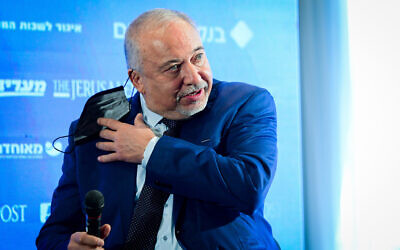 Finance Minister Avigdor Liberman speaks at the Maariv conference in Herzliya, on December 7, 2021. ( Avshalom Sassoni/Flash90)