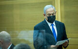 Opposition leader Benjamin Netanyahu during a Likud faction meeting at the Knesset, on December 13, 2021. (Yonatan Sindel/Flash90)