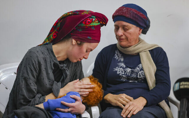 Ettya Dimentman (L), whose husband Yehuda was killed outside the illegal outpost of Homesh in the northern West Bank, gives a press conference on December 19, 2021 (Yonatan Sindel /Flash90) Ettya Dimentman (L), whose husband Yehuda was killed outside the illegal outpost of Homesh in the northern West Bank, gives a press conference on December 19, 2021 (Yonatan Sindel /Flash90)