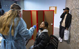 A COVID-19 rapid antigen carried out at a Magen David Adom testing center in Jerusalem, on December 22, 2021. (Olivier Fitoussi/Flash90)