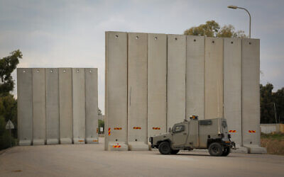 Israeli soldiers near the site of where a civilian was injured by gunfire from the Gaza Strip, in southern Israel, December 29, 2021 (Flash90)