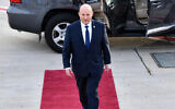 Prime Minister Naftali Bennett boards a plane at Ben Gurion Airport for the United Arab Emirates, on December 12, 2021. (Haim Zach/GPO)