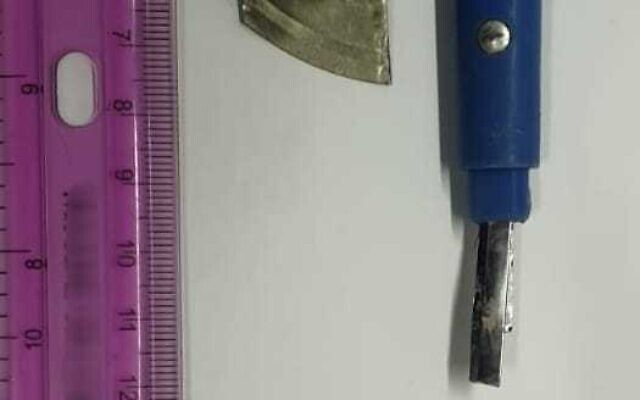 This photo released by police on December 23, 2021, shows the shiv allegedly used by a Palestinian security prisoner to stab a guard at a prison in southern Israel, (Israel Police) This photo released by police on December 23, 2021, shows the shiv allegedly used by a Palestinian security prisoner to stab a guard at a prison in southern Israel, (Israel Police)