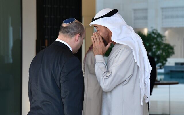 UAE Crown Prince Sheikh Mohammed bin Zayed whispers to Prime Minister Naftali Bennett in Abu Dhabi, on December 13, 2021. (Haim Zach/GPO) UAE Crown Prince Sheikh Mohammed bin Zayed whispers to Prime Minister Naftali Bennett in Abu Dhabi, on December 13, 2021. (Haim Zach/GPO)