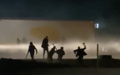 A screenshot from video of a mass brawl in the southern Bedouin village of Abu Queider on December 17, 2021. (Screen capture: Twitter)