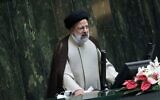 Iranian President Ebrahim Raisi addresses during a joint session of lawmakers and cabinet members at the parliament, in Tehran, Iran, December 1, 2021. (AP Photo/Vahid Salemi)