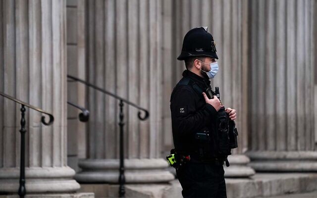 Illustrative: A police officer in London, on December 16, 2021. (AP Photo/Alberto Pezzali) Illustrative: A police officer in London, on December 16, 2021. (AP Photo/Alberto Pezzali)