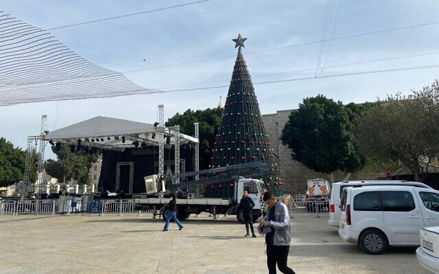 Palestinians prepare to welcome in a month of muted Christmas celebrations in Bethlehem on Friday, December 3, 2021 (Aaron Boxerman/The Times of Israel) Palestinians prepare to welcome in a month of muted Christmas celebrations in Bethlehem on Friday, December 3, 2021 (Aaron Boxerman/The Times of Israel)