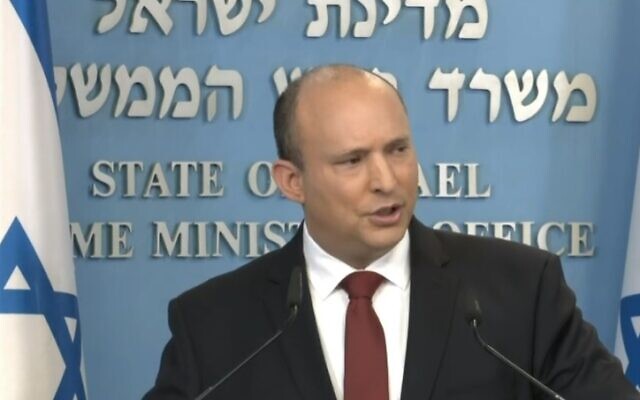 Prime Minister Naftali Benntt during a press briefing about the COVID-19 pandemic, December 19, 2021 (video screenshot)