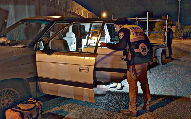 Paramedics work at the scene of a shooting attack near Homesh in the West Bank, on December 16, 2021. (ZAKA) Paramedics work at the scene of a shooting attack near Homesh in the West Bank, on December 16, 2021. (ZAKA)
