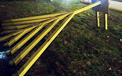 A Hanukkah menorah that had been knocked to the ground lies flat in Kyiv on Nov. 30, 2021. (The Ukrainian Jewish Committee via JTA)