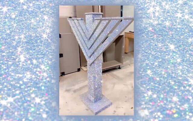 The Liberace-style menorah of Amsterdam in a warehouse during its construction in Amersfoort, the Netherlands, Dec. 3, 2021. (Barry Mehler via JTA) The Liberace-style menorah of Amsterdam in a warehouse during its construction in Amersfoort, the Netherlands, Dec. 3, 2021. (Barry Mehler via JTA)