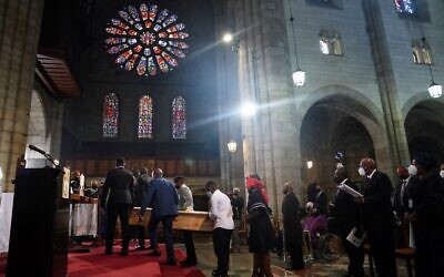 Family members carry the coffin of South African anti-apartheid icon Archbishop Desmond Tutu during the requiem mass of Tutu at St. Georges Cathedral in Cape Town on January 1, 2022 (Nic BOTHMA / POOL / AFP)