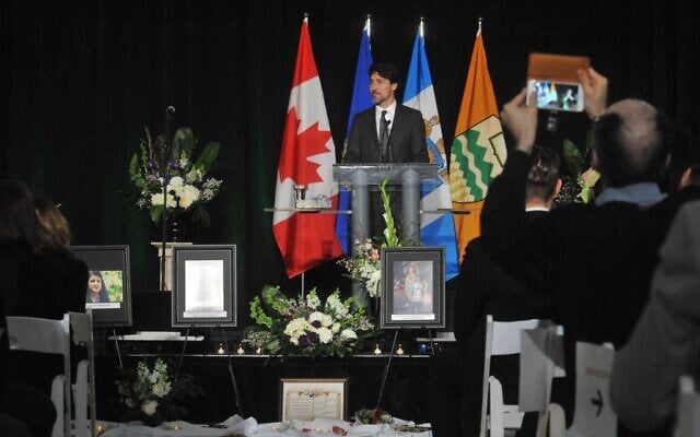 Canadian Prime Minister Justin Trudeau speaks at a memorial service for the victims of the Ukrainian Airlines flight PS752 crash in Iran at the Saville Community Sports Centre in Edmonton, Canada, January 12, 2020. (Walter Tychnowicz / AFP) Canadian Prime Minister Justin Trudeau speaks at a memorial service for the victims of the Ukrainian Airlines flight PS752 crash in Iran at the Saville Community Sports Centre in Edmonton, Canada, January 12, 2020. (Walter Tychnowicz / AFP)