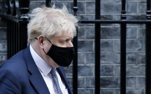 Britain's Prime Minister Boris Johnson leaves from 10 Downing Street in central London on January 12, 2022. (Tolga Akmen / AFP) Britain's Prime Minister Boris Johnson leaves from 10 Downing Street in central London on January 12, 2022. (Tolga Akmen / AFP)