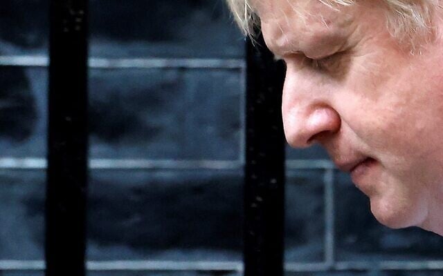 Britain's Prime Minister Boris Johnson leaves from 10 Downing Street to make a statement to MPs in the House of Commons following the publication of the Gray report, in central London on January 31, 2022. (Photo by Tolga Akmen / AFP)