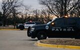 A police vehicle patrols an intersection on January 15, 2022, in Colleyville, Texas, near Congregation Beth Israel. (Brandon Bell/Getty Images via AFP)