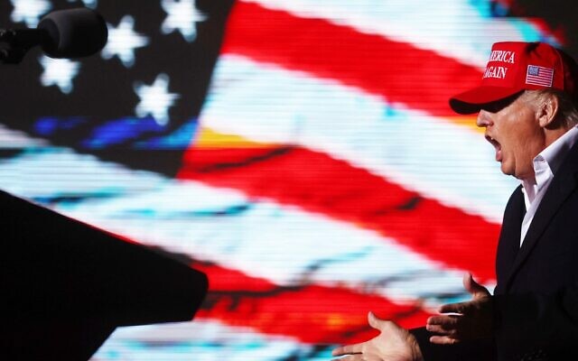 Former US president Donald Trump prepares to speak at a rally at the Canyon Moon Ranch festival grounds on January 15, 2022 in Florence, Arizona. The rally marks Trump's first of the midterm election year with races for both theUS Senate and governor in Arizona this year. (Mario Tama/Getty Images/AFP) Former US president Donald Trump prepares to speak at a rally at the Canyon Moon Ranch festival grounds on January 15, 2022 in Florence, Arizona. The rally marks Trump's first of the midterm election year with races for both theUS Senate and governor in Arizona this year. (Mario Tama/Getty Images/AFP)